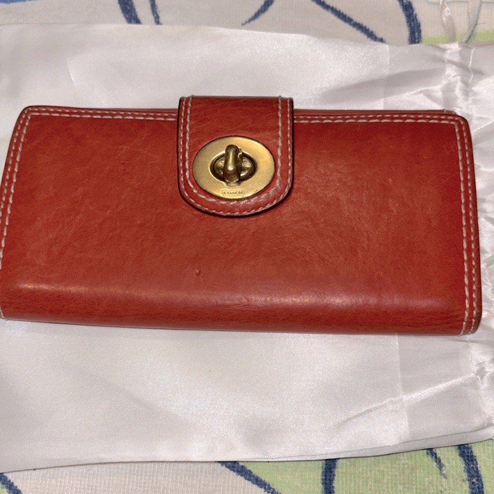 EUC COACH long Continental Turnlock Wallet.